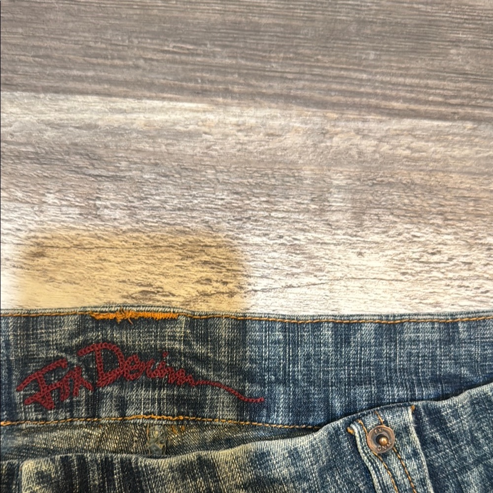 Classic Blue Straight Leg Jeans with Distressed Details